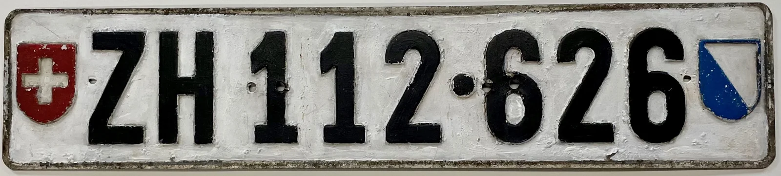 Lange Zürcher Autonummer ZH 112 626 mit zwei Wappen